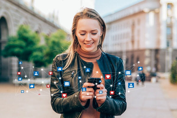 Woman using cellphone, communication and digital icons.