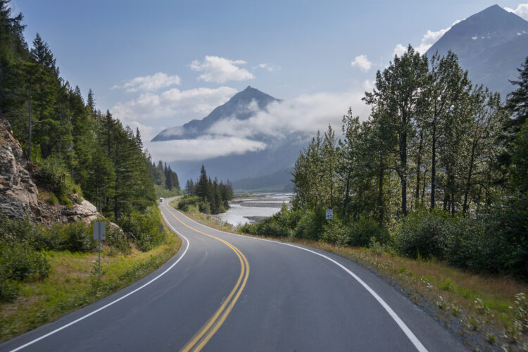 Green mountains and the open road.