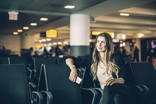 Woman sitting at airport 