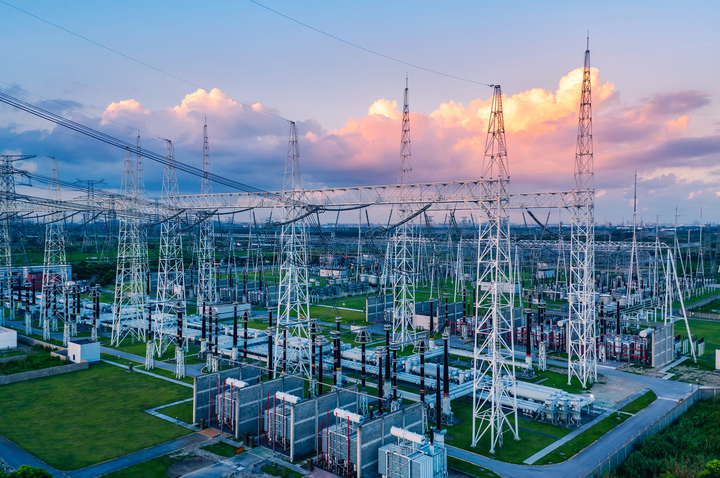 Industrial power grid at sunset