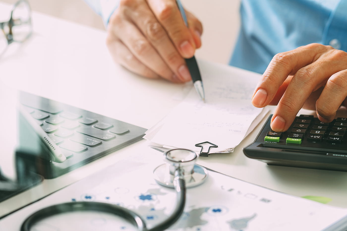 Healthcare worker writing something down 