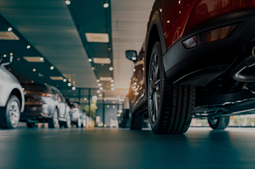 Cars in an automotive dealership.